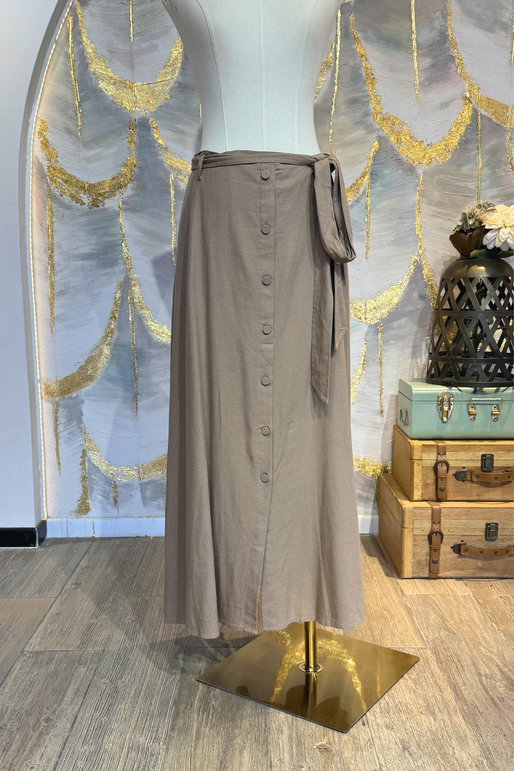 Falda beige con bonotes